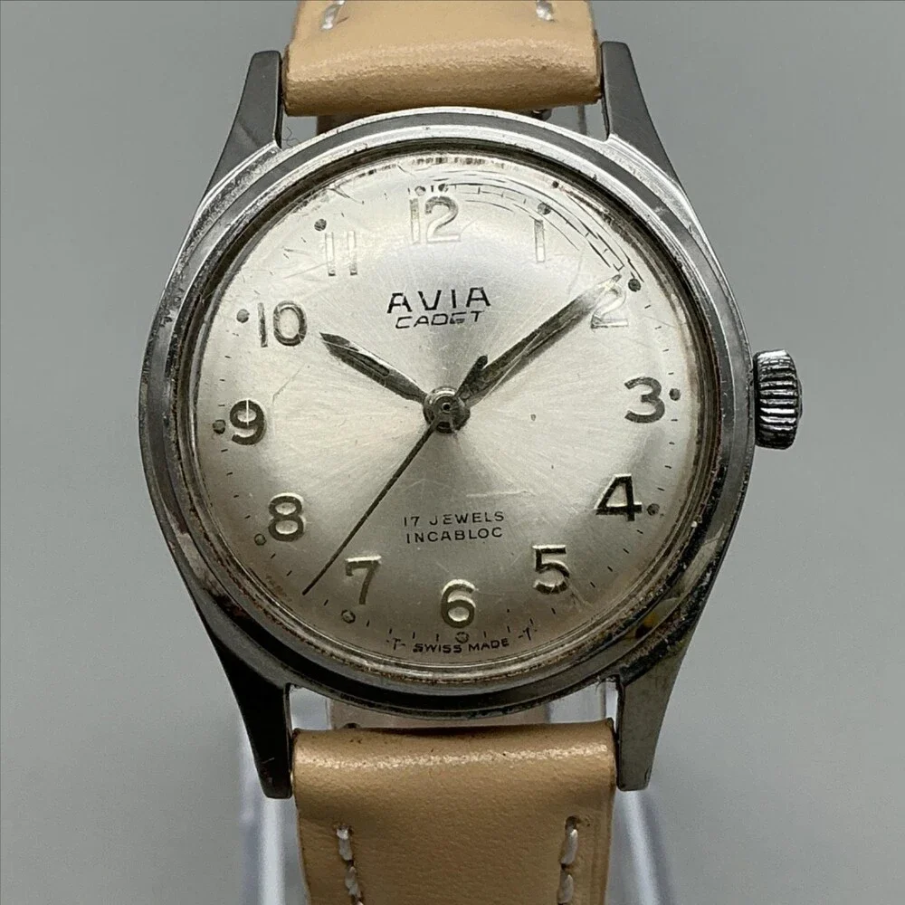 Vintage Avia Cadet Mens Watch 29mm Silver Tone Beige Leather Manual Wind